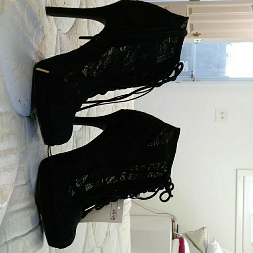 High heel bootie lace heels.